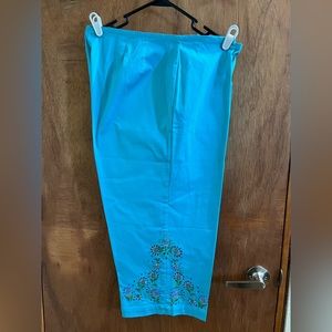 Avenue capris turquoise blue with beautiful embroidery on legs!  Size 18